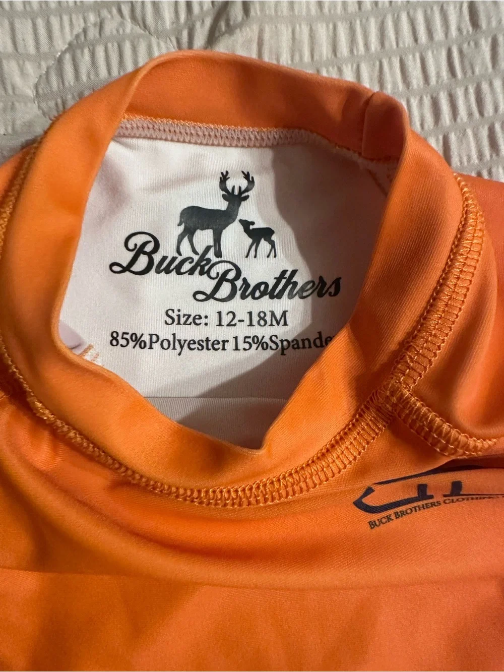 Kids Orange Rash Guard Top and Camo Swim Trunks Set